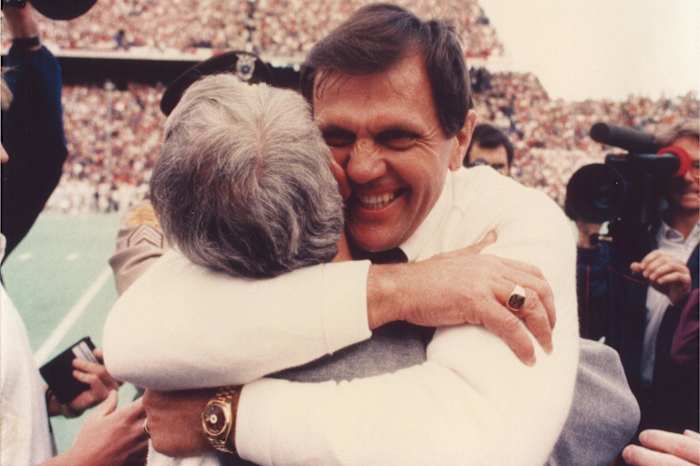 Former Texas A&M Aggies coach Jackie Sherrill hugs his then-defensive coordinator, R.C. Slocum at Kyle Field.