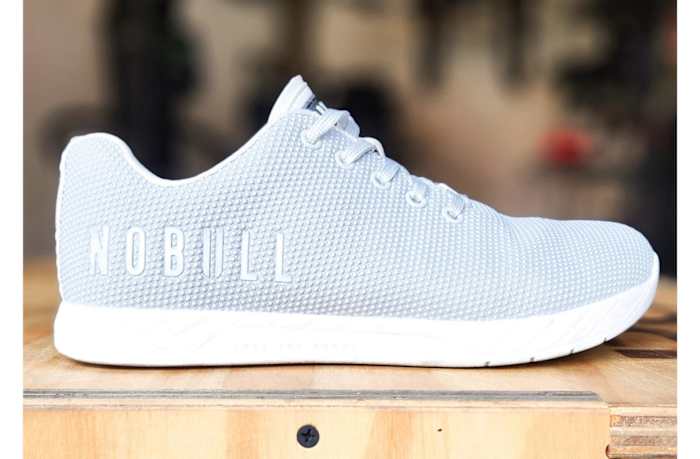 nobull-trainer-gray-on-a-wooden-box-close-up