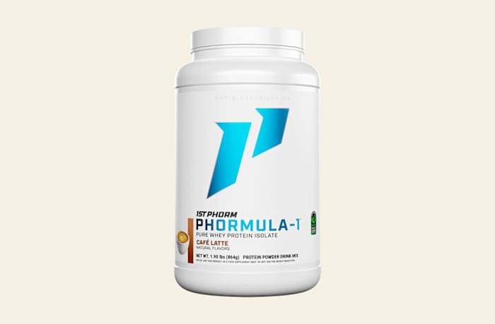 A white cylindrical container of 1st Phorm Phormula-1 pure whey protein isolate