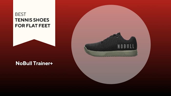 An image of a black NoBull Trainer+ against a red background.