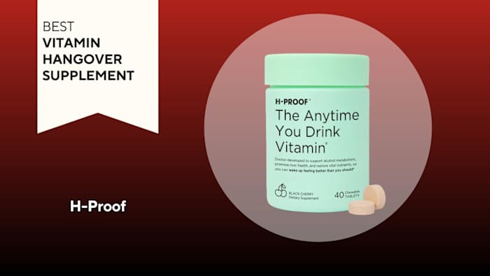 A mint green bottle of H-Proof The Anytime You Drink Vitamin against a red background.