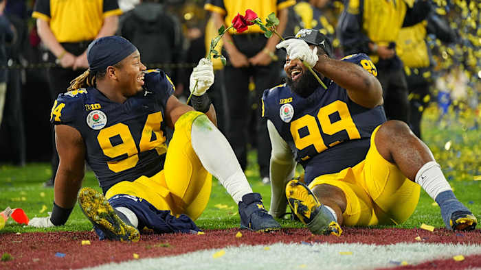 Michigan defensive linemen Kris Jenkins (left) and Cam Goode celebrate at the Rose Bowl.