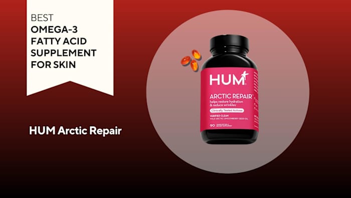 An image of a bottle of HUM Arctic Repair against a red background.