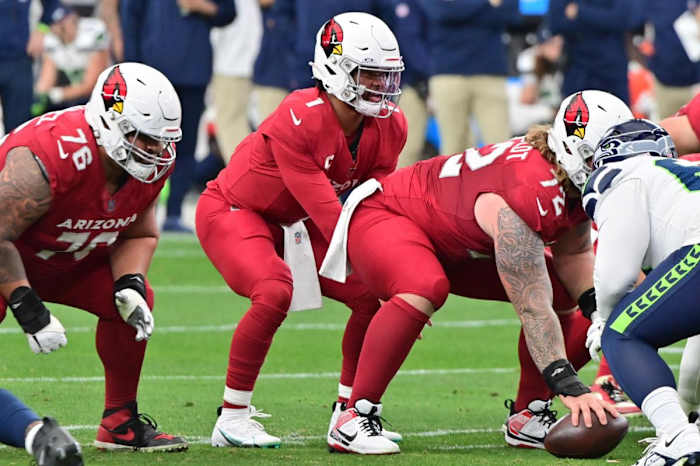 Arizona Cardinals quarterback Kyler Murray (1) takes a snap in the first half against the Seattle Seahawks at State Farm Stadium.