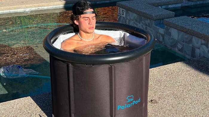 Man soaking in PolarPod Ice Bath