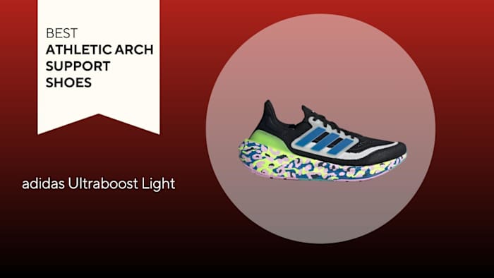 An image of a multi-colored adidas Ultaboost Light athletic shoe against a red background.