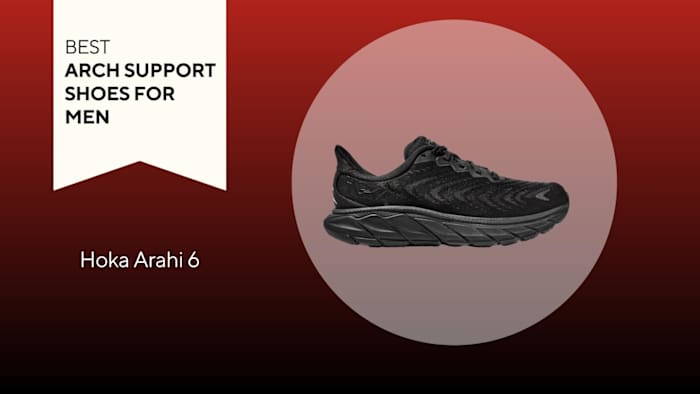 An image of a Hoka Arahi 6 shoe against a red background.