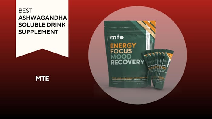 A red and black background with a white banner that reads Best Ashwagandha Soluble Drink Supplement next to a green bag of MTE powder