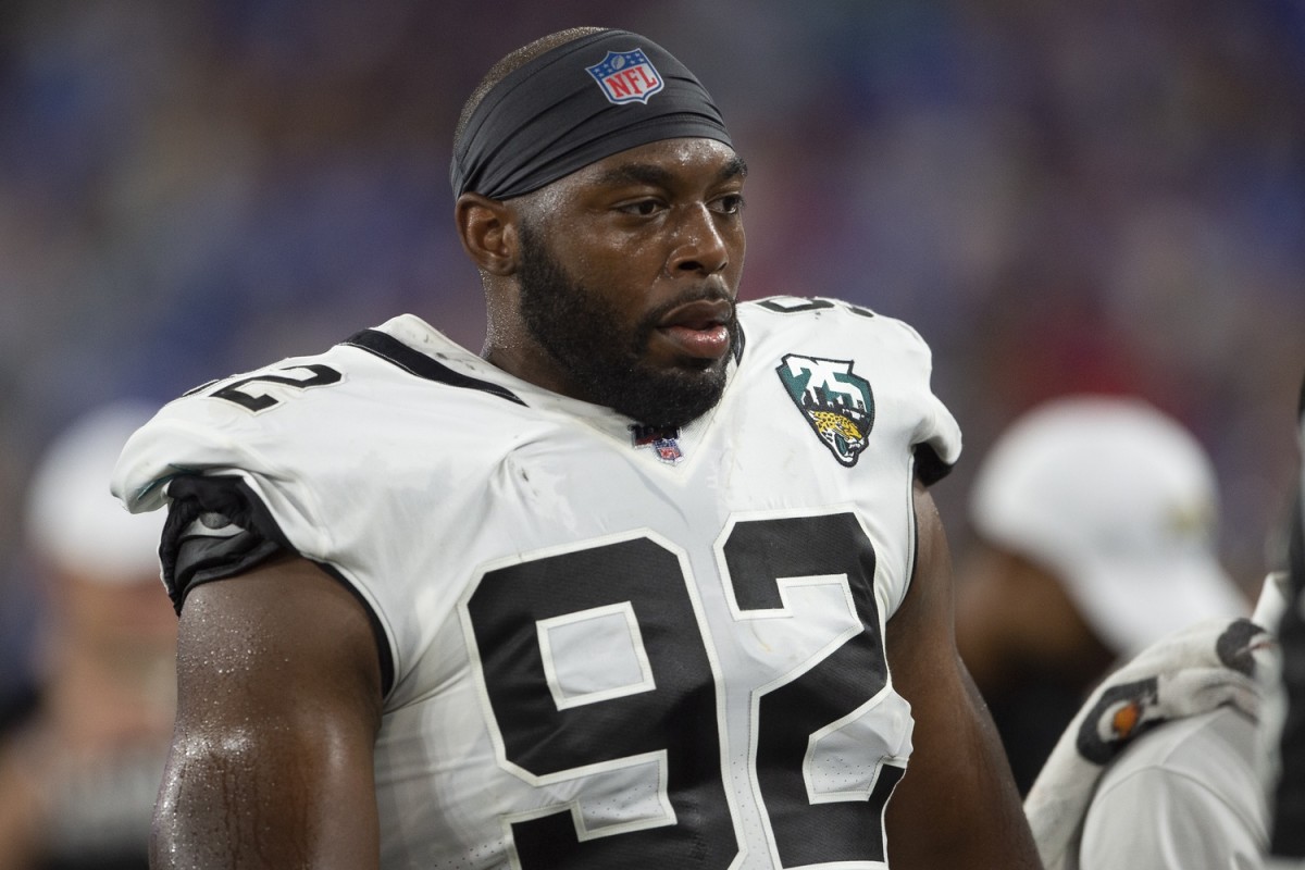 Jacksonville Jaguars defensive end Lyndon Johnson (92) stands on the sidelines during the during the second half of the game against the Baltimore Ravens at M&T Bank Stadium.