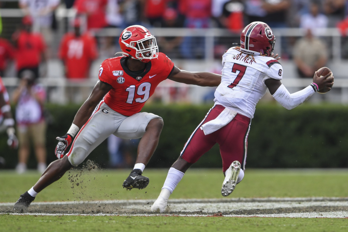 Adam Anderson coming in to tackle South Carolina QB, Dakereon Joyner.