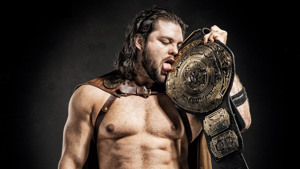 Wrestler Marty “The Moth” Martinez with the Lucha Underground championship