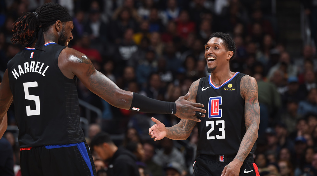 lou_will_and_montrezl_dap_up.jpg