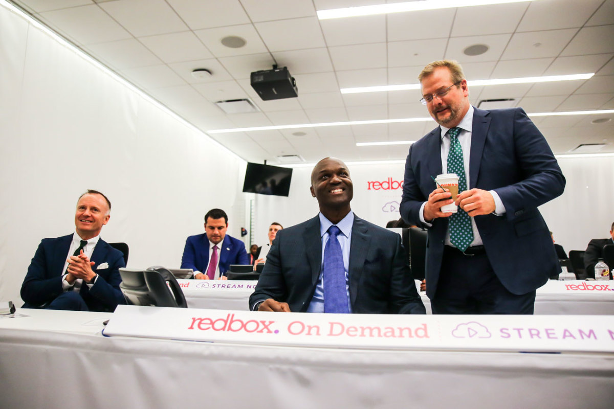 Christopher Johnson, Todd Bowles and Mike Maccagnan are all smiles on draft night.