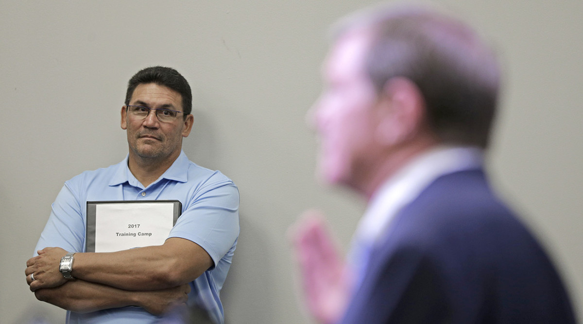 Rivera listened to Hurney address the press on Wednesday.