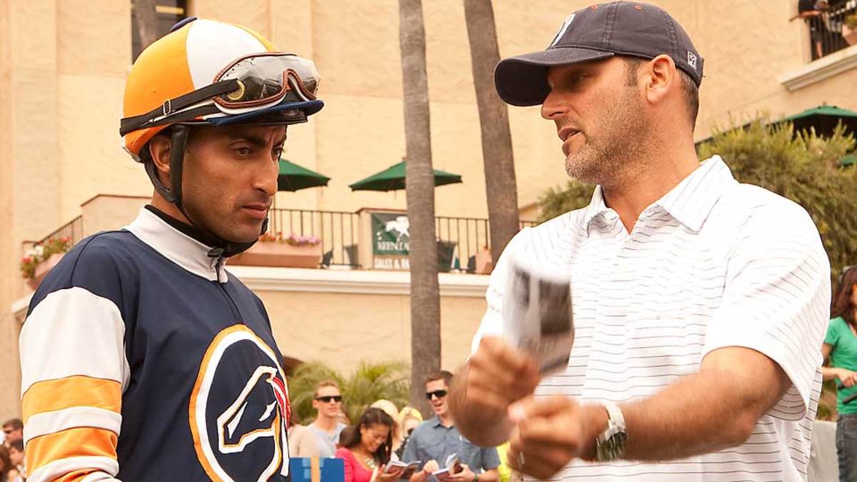 Billy Koch (right) has turned his lifelong passion for horse racing into a lucrative business.
