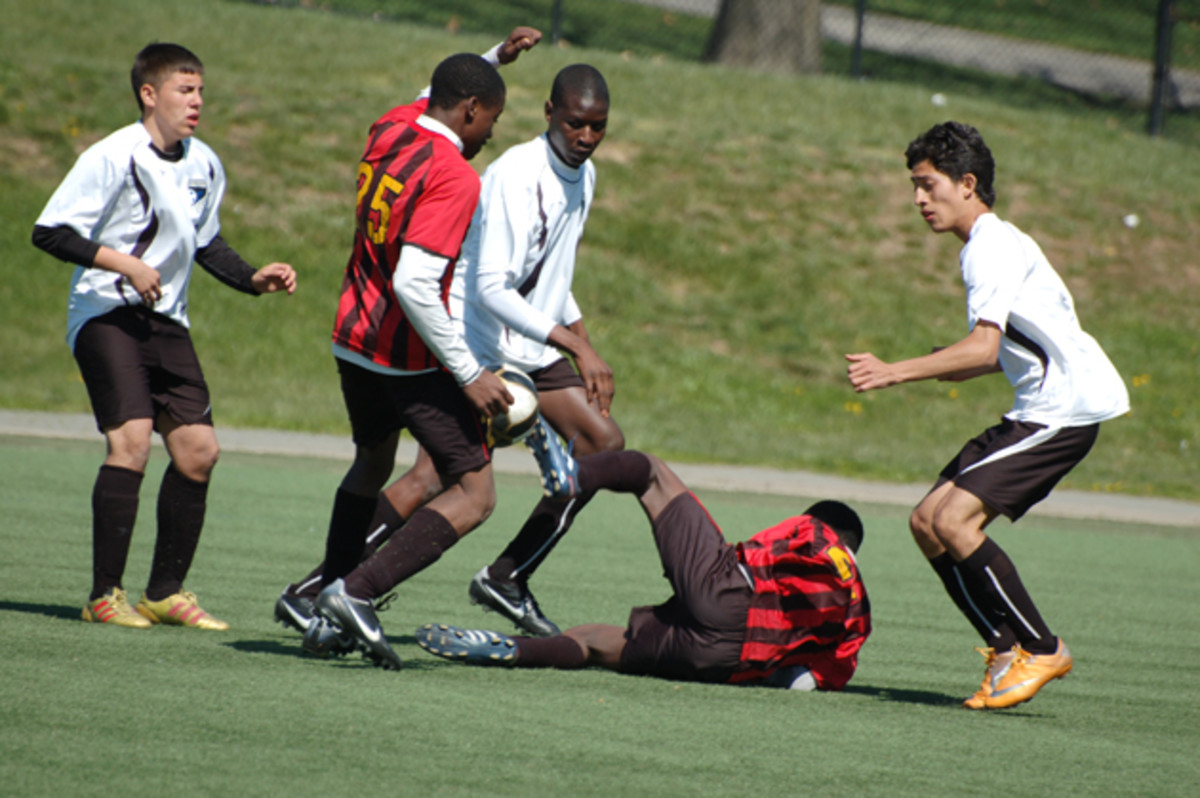 Bakary (center) and South Bronx United play against the Rosedale Rockets in the Icahn Stadium on Randall’s Island in 2012.
