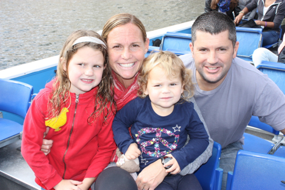 USWNT captain Christie Rampone with her daughters Rylie and Reece and husband Chris.