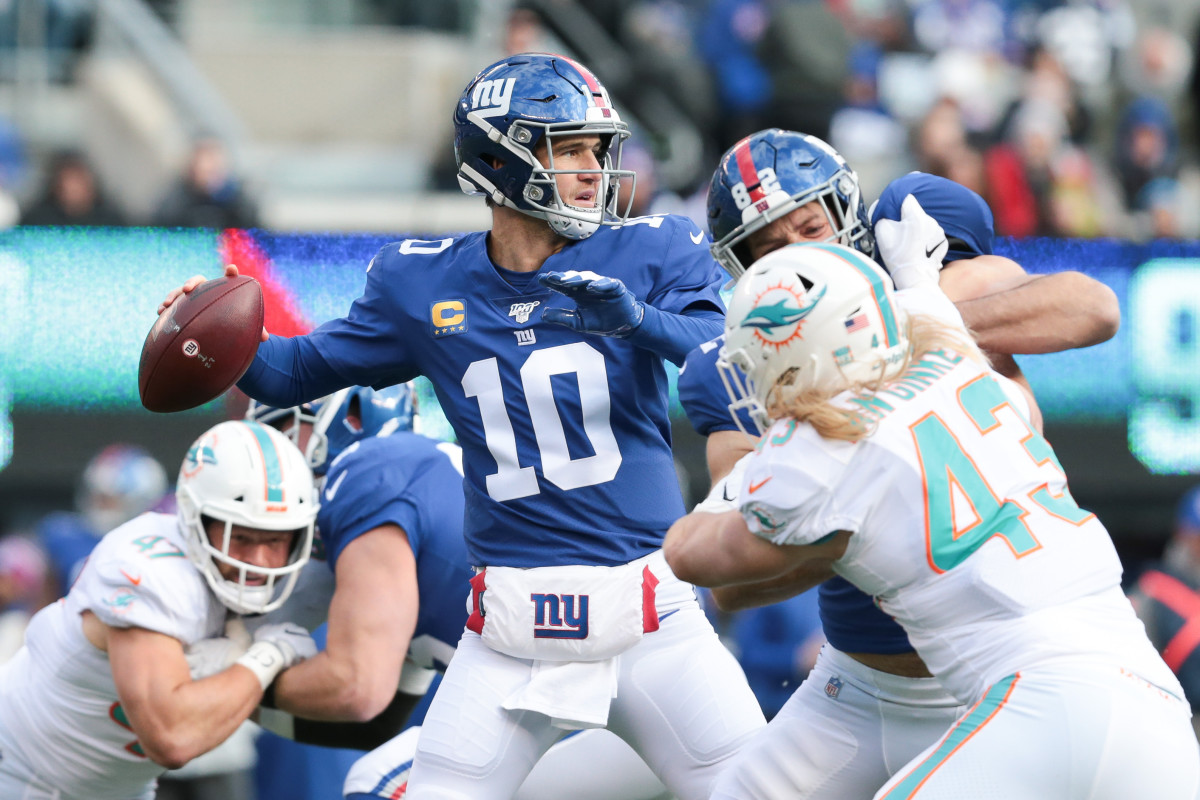 Dec 15, 2019: Giants quarterback Eli Manning throws a pass during the first quarter at MetLife Stadium. 
