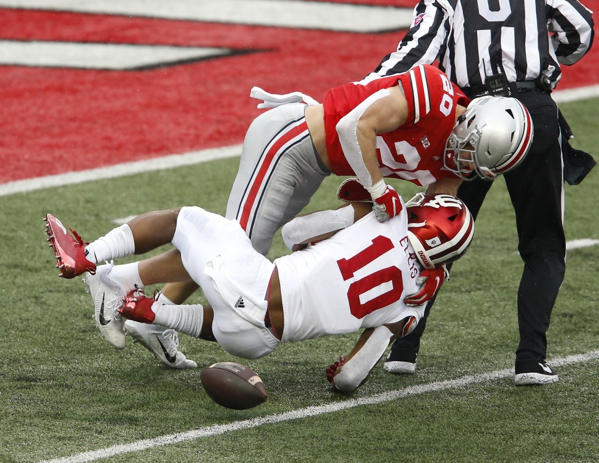 Indiana running back David Ellis (10) fumbles while after being stripped by Ohio State linebacker Pete Werner (20) during the second quarter at Ohio Stadium. (Joseph Maiorana/USA TODAY Sports)