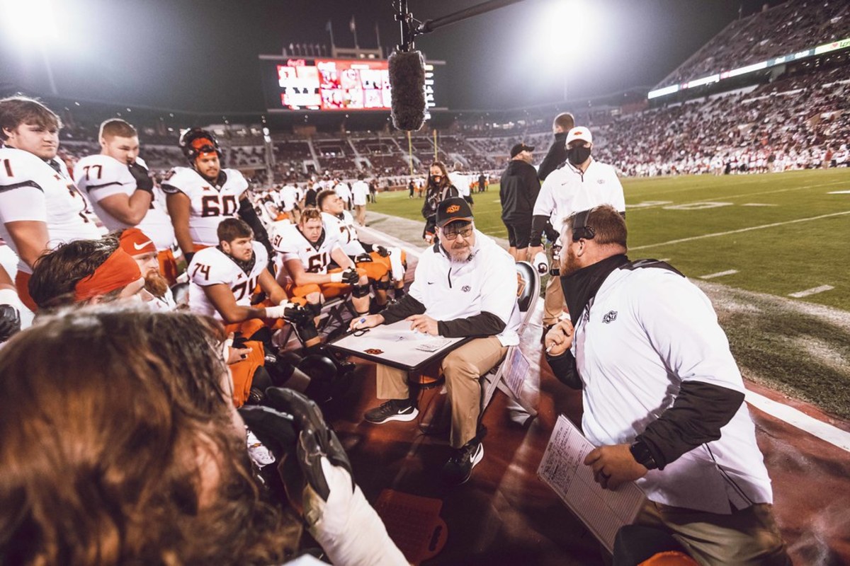 Charlie Dickey (in the middle) has his work cut of him with retooling an injured offensive line.