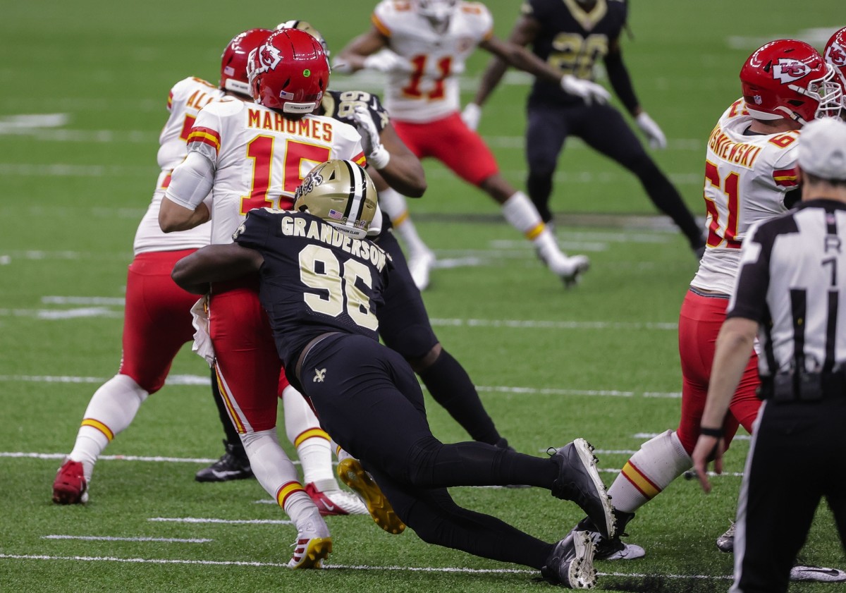 Dec 20, 2020; New Orleans, Louisiana, USA; Saints defensive end Carl Granderson (96) sacks Chiefs quarterback Patrick Mahomes (15) during the first half at the Mercedes-Benz Superdome. Mandatory Credit: Derick E. Hingle-USA TODAY Sports