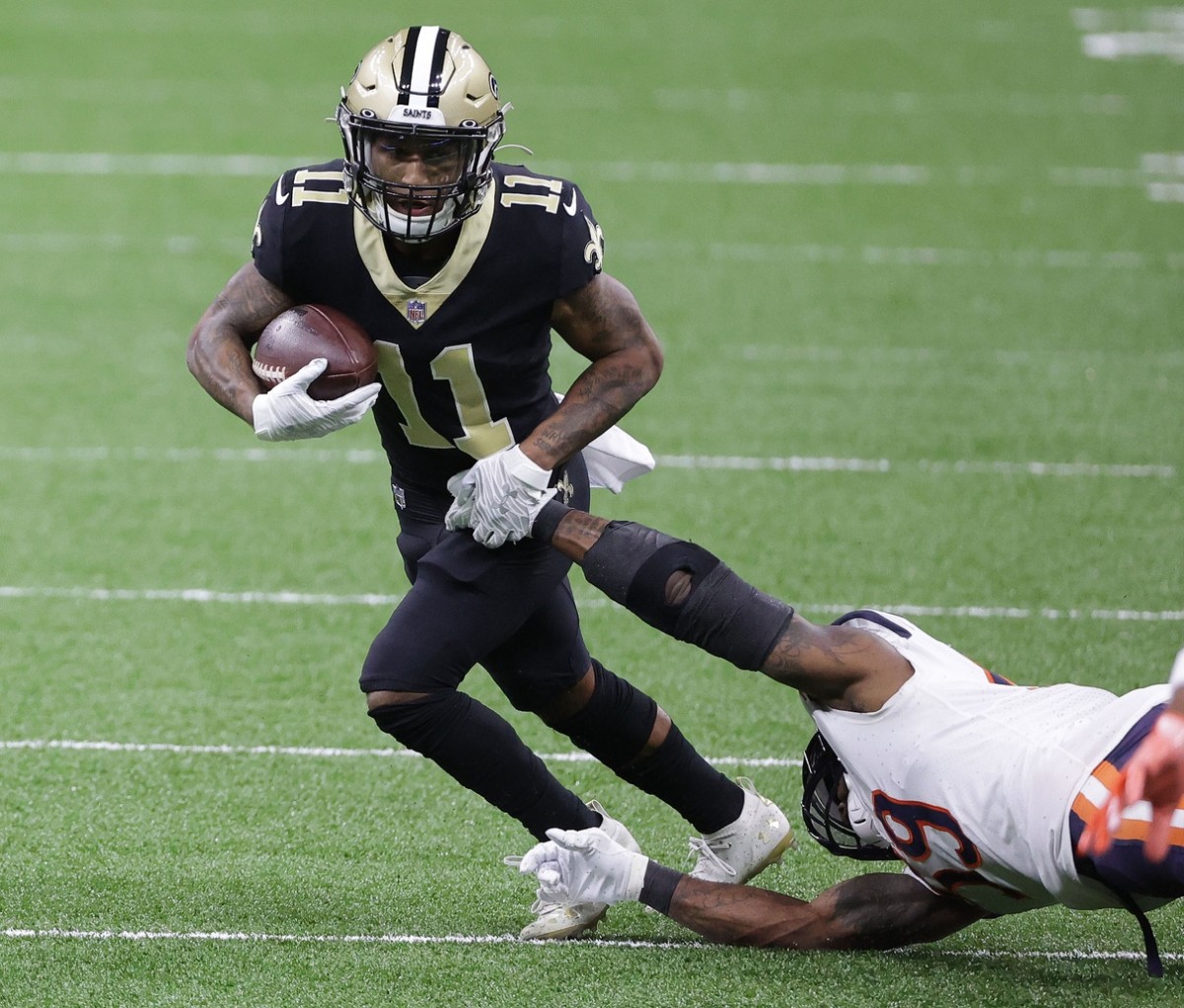 Jan 10, 2021; New Orleans, Louisiana, USA; New Orleans wide receiver Deonte Harris (11) runs the ball against Chicago in the NFC Wild Card game at Mercedes-Benz Superdome. Mandatory Credit: Derick E. Hingle-USA TODAY