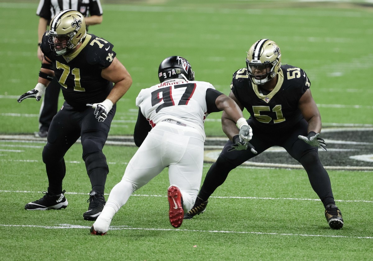 Nov 22, 2020; New Orleans, Louisiana, USA; Cesar Ruiz (51) blocks Atlanta Falcons defensive tackle Grady Jarrett (97) during the second half at the Mercedes-Benz Superdome. Mandatory Credit: Derick E. Hingle-USA TODAY 