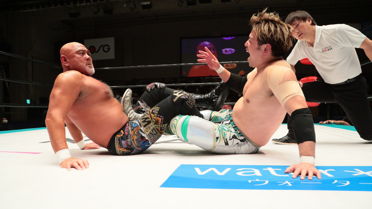 Keiji Mutoh puts Go Shiozaki in a figure-four leglock