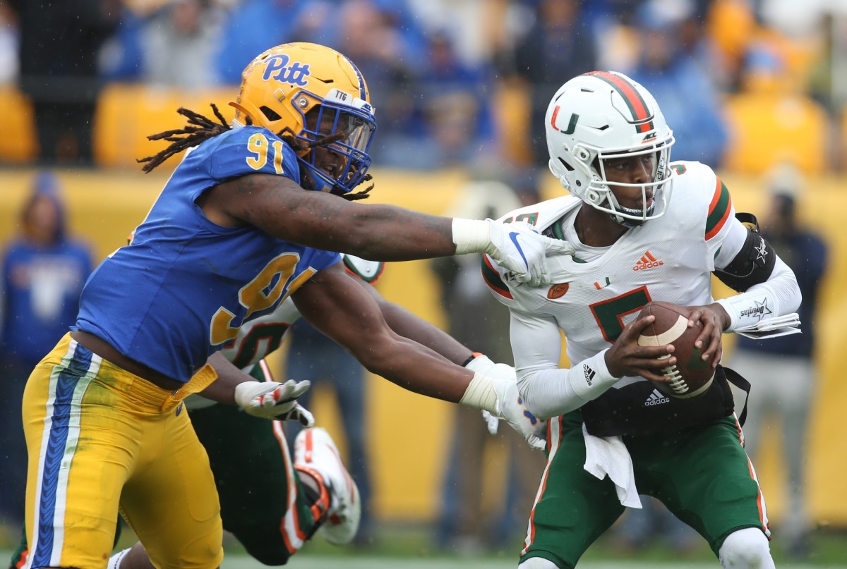 Jones II sacks Miami Hurricanes quarterback N'Kosi Perry in a 2019 game. 