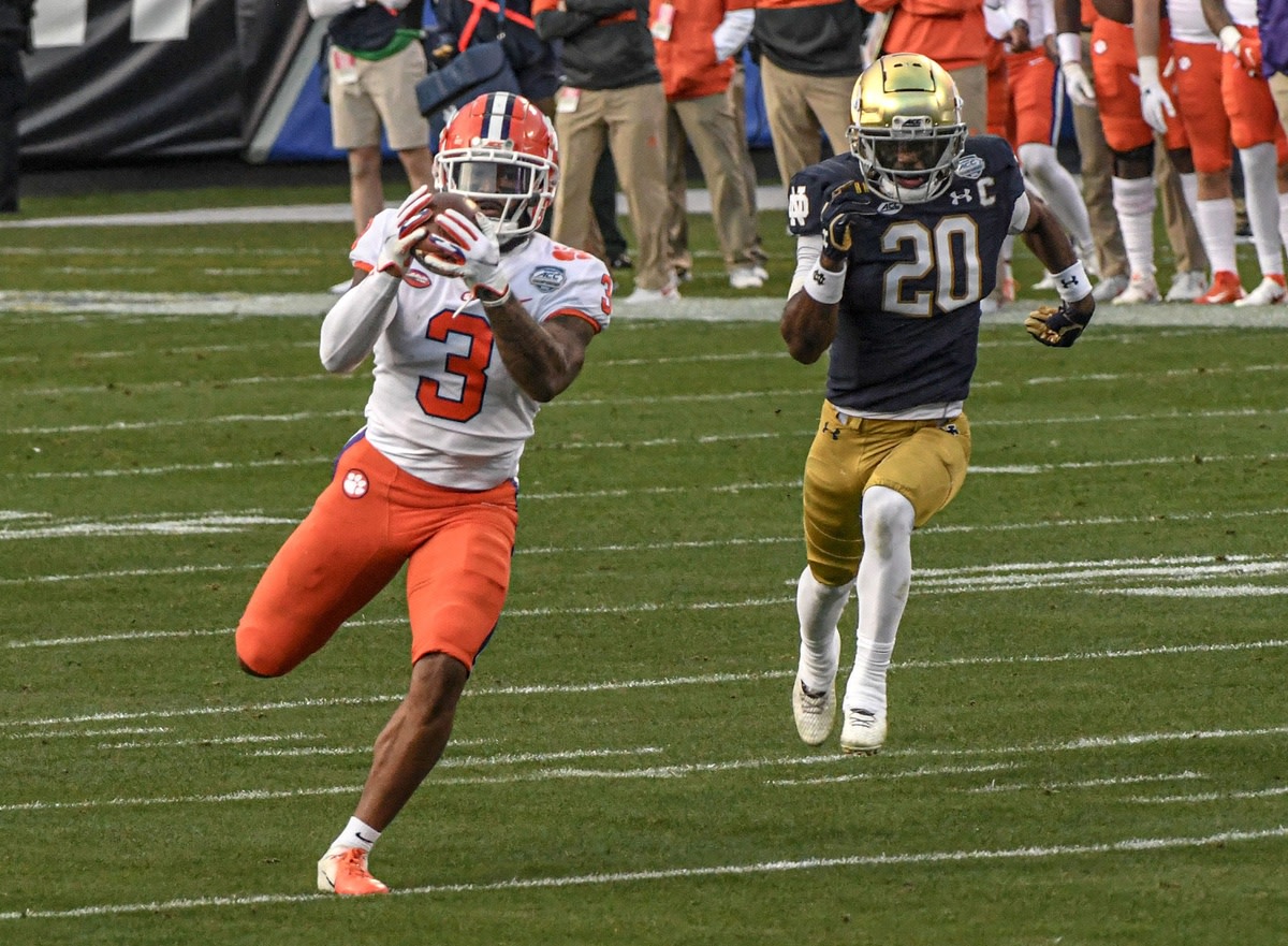 Rodgers catches a pass for a 67-yard touchdown against Notre Dame. 