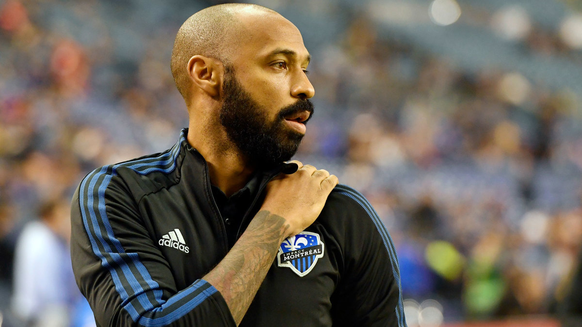 Thierry Henry in a CF Montreal jacket