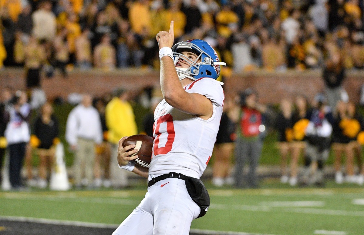 Mississippi Rebels quarterback John Rhys Plumlee (10) celebrates after scoring during the second half against the Missouri Tigers at Memorial Stadium/Faurot Field. Mandatory Credit: Denny Medley-USA TODAY Sports