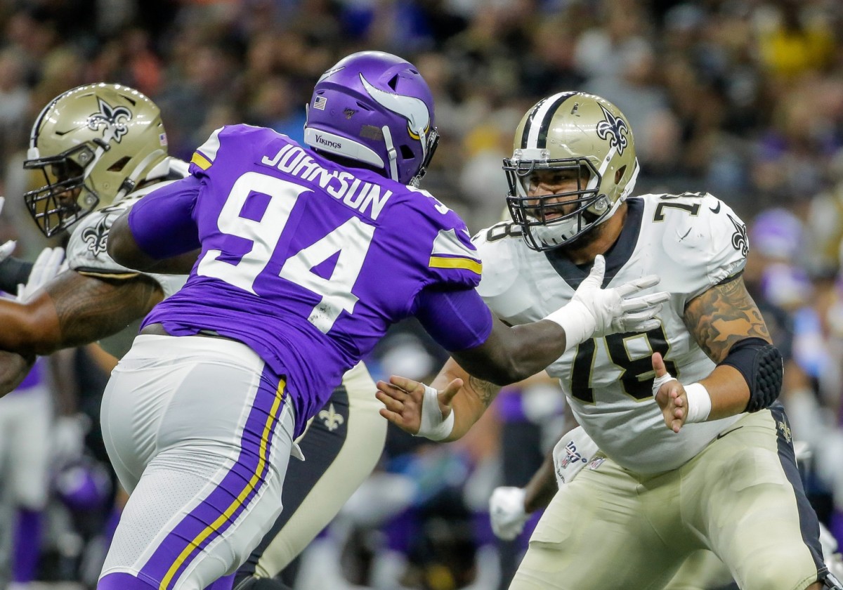 Aug 9, 2019; New Orleans, LA, USA; New Orleans Saints center Erik McCoy (78) blocks against Minnesota Vikings defensive tackle Jaleel Johnson (94) during the first quarter at the Mercedes-Benz Superdome. Mandatory Credit: Derick E. Hingle-USA TODAY Sports