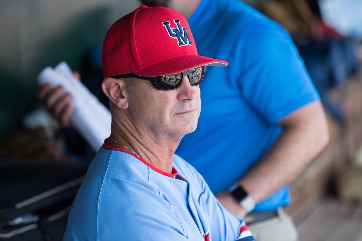 Mississippi Rebels head coach Mike Bianco looks on from the dugout during the game against the Arkansas Razorbacks at Baum-Walker Stadium. Mandatory Credit: Brett Rojo-USA TODAY Sports