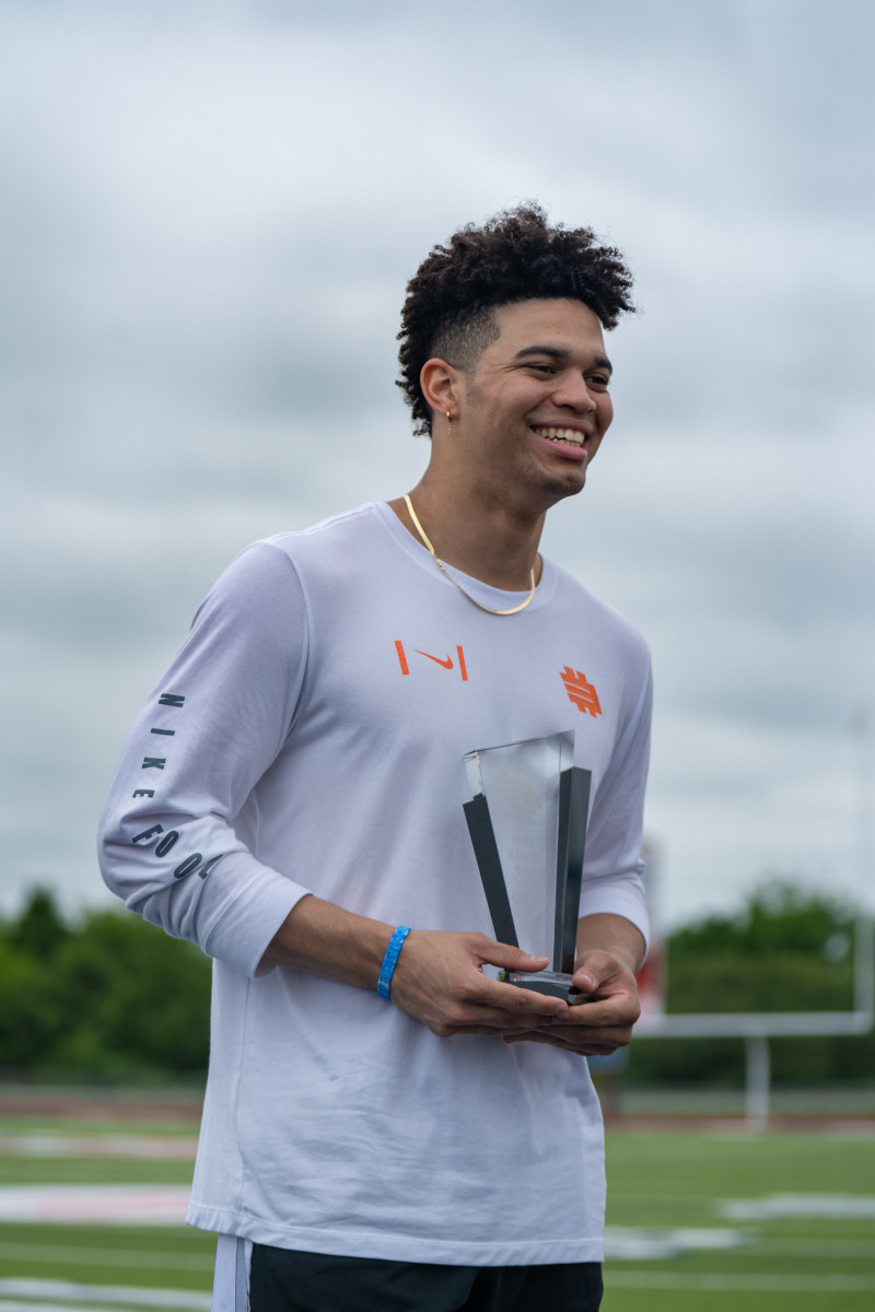 Caleb Williams, holding the Elite11 MVP trophy, will announce his college choice at 8 p.m. CT Saturday.