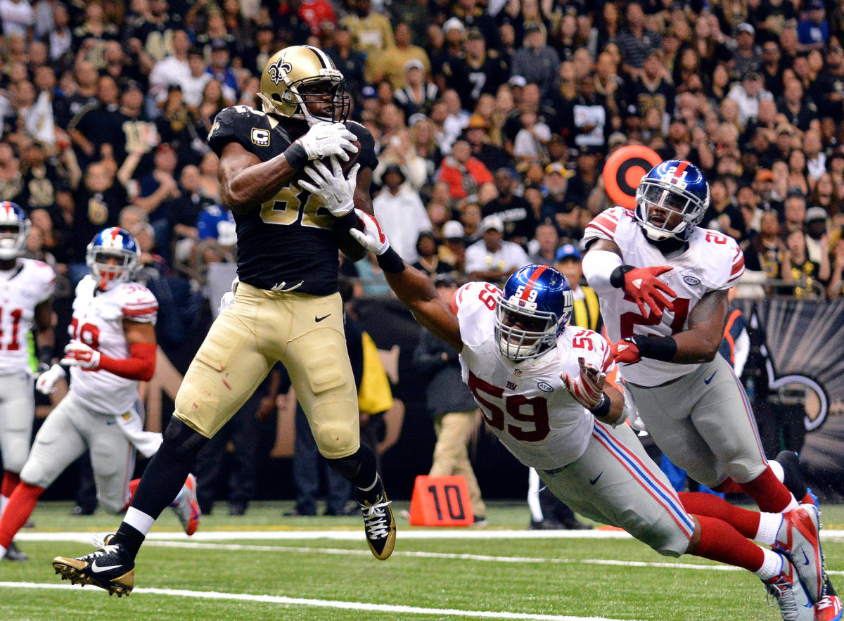 Former New Orleans Saints TE Ben Watson (82) catches a touchdown pass from QB Drew Brees in a 2015 victory against the Giants. Credit: New York Times 