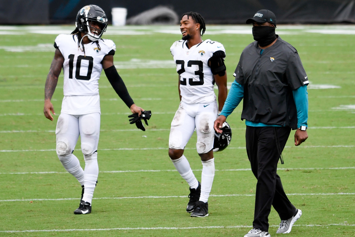 Henderson (23) walks off the field with teammate Laviska Shenault (10) after a game winning performance in his rookie debut versus the Indianapolis Colts. Mandatory Credit: Douglas DeFelice-USA TODAY Sports