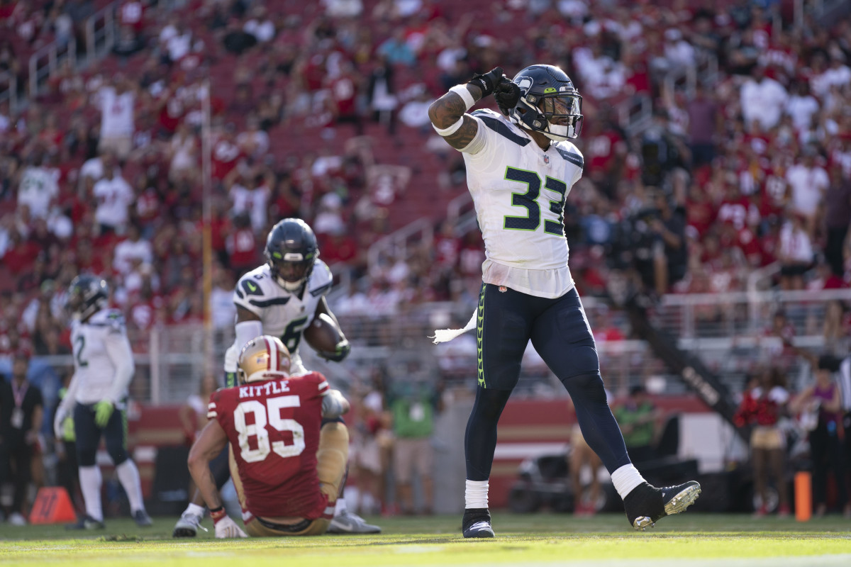 Seattle Seahawks strong safety Jamal Adams (33) celebrates after hitting San Francisco 49ers tight end George Kittle (85) for an incomplete pass during the third quarter at Levi's Stadium.