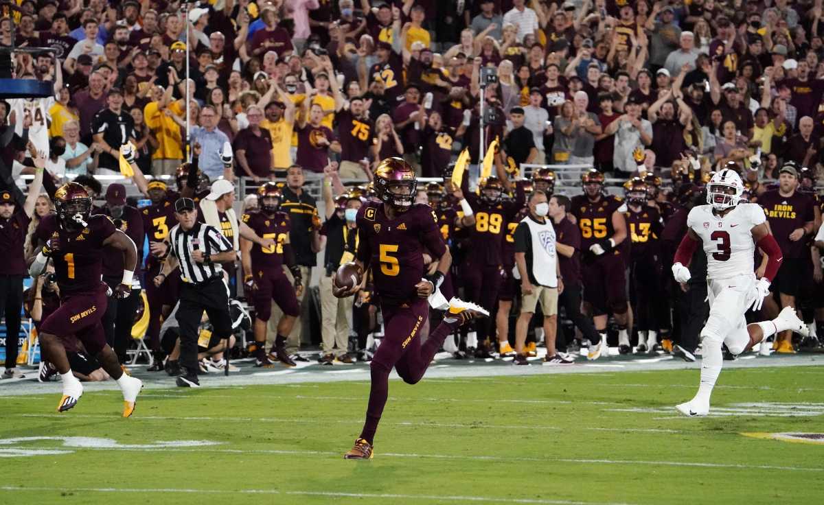 Arizona State quarterback Jayden Daniels (5) runs for a touchdown against Stanford.