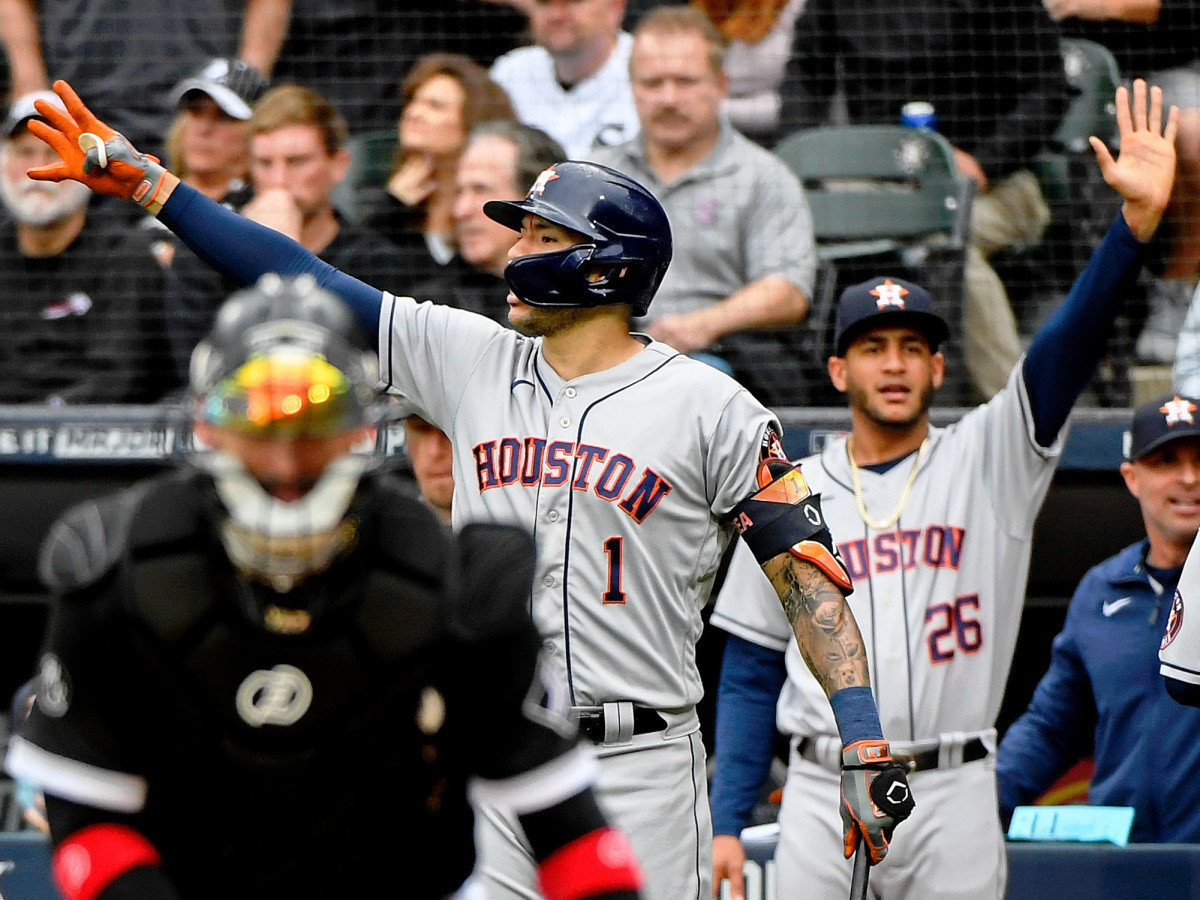 Houston Astros shortstop Carlos Correa (1) celebrates after third baseman Alex Bregman (not pictured) hit a two-run RBI double against the Chicago White Sox