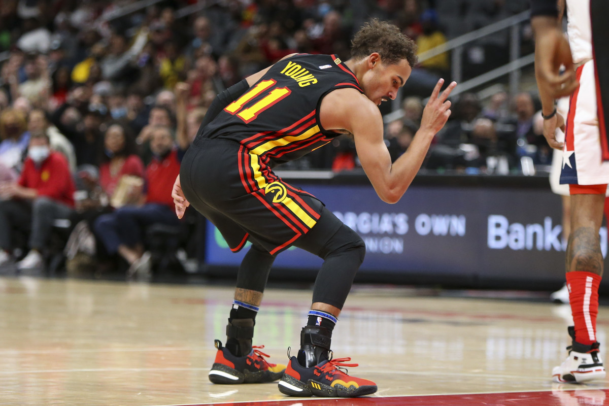 Nov 1, 2021; Atlanta, Georgia, USA; Atlanta Hawks guard Trae Young (11) celebrates after a made basket against the Washington Wizards in the second half at State Farm Arena.