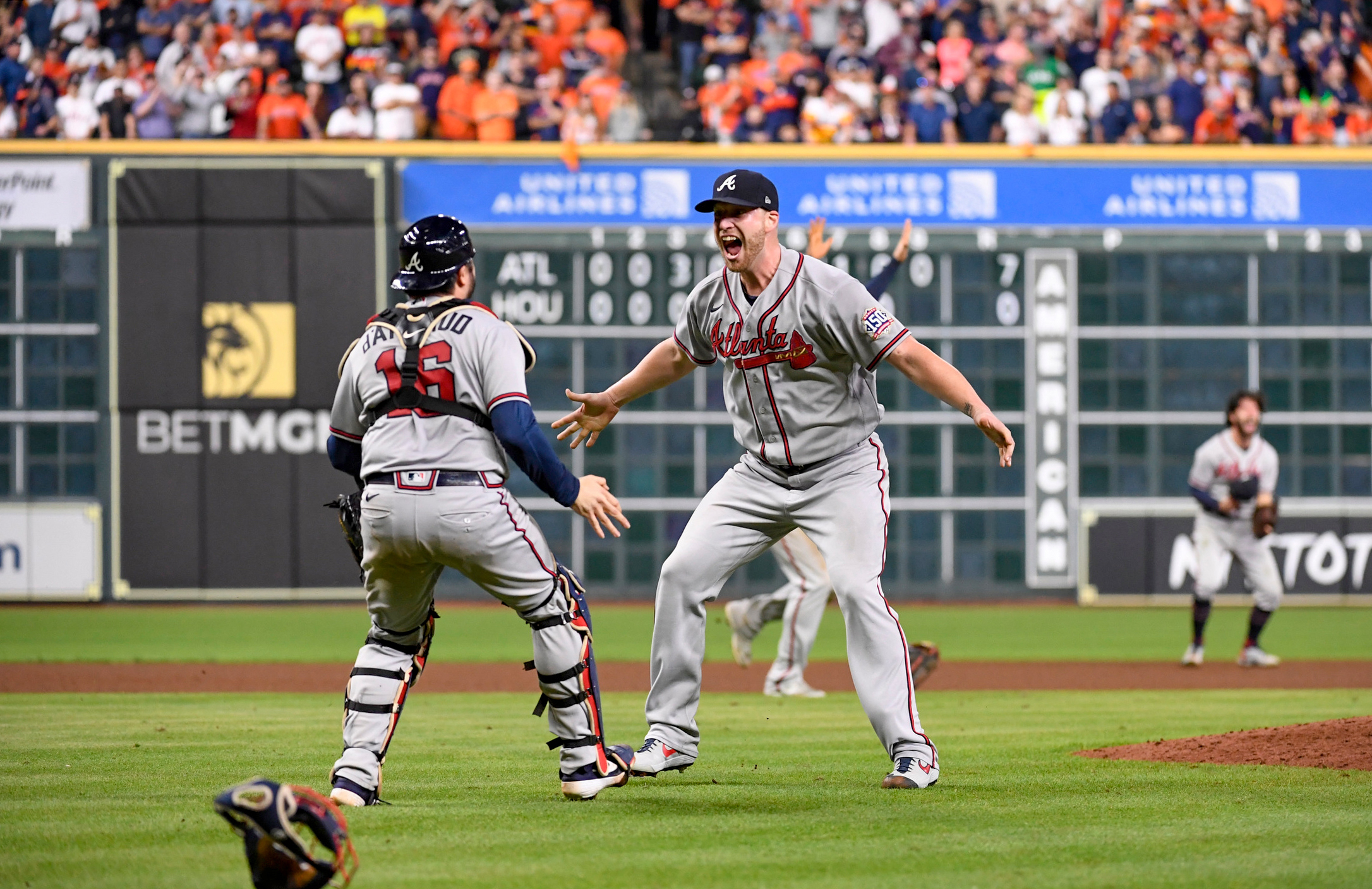 Closer Will Smith and catcher Travis d'Arnaud celebrate in front of the mound after the Braves recorded the final out in their Game 6 win over the Astros to capture their first World Series title since 1995.