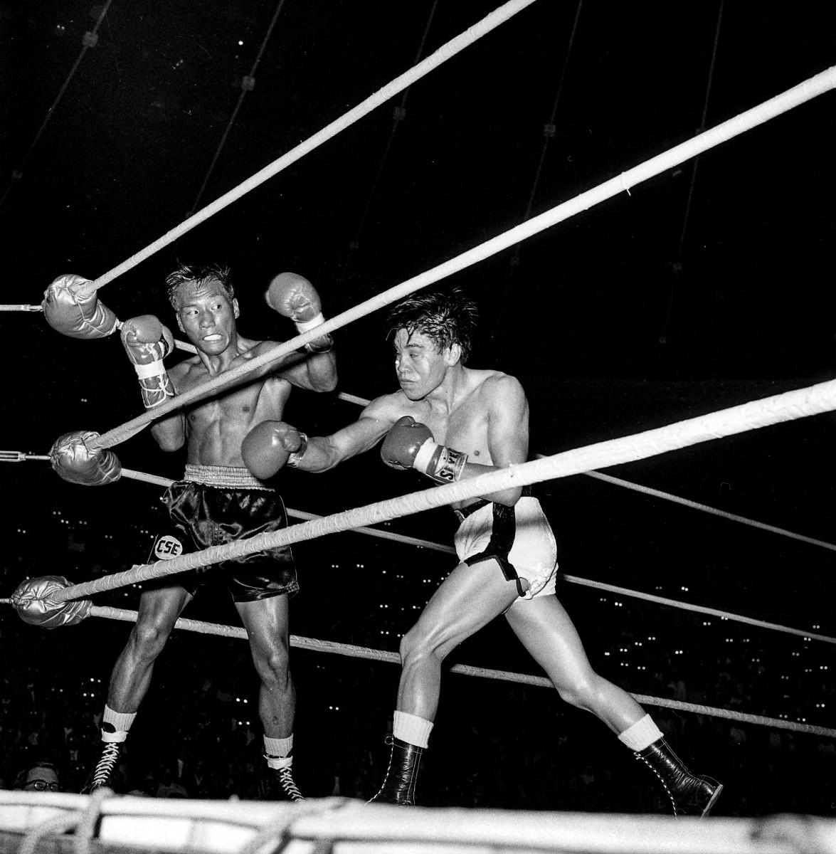 In researching Olivares (right, fighting Ernie Cruz in 1969), Yalen found a win that went forgotten.
