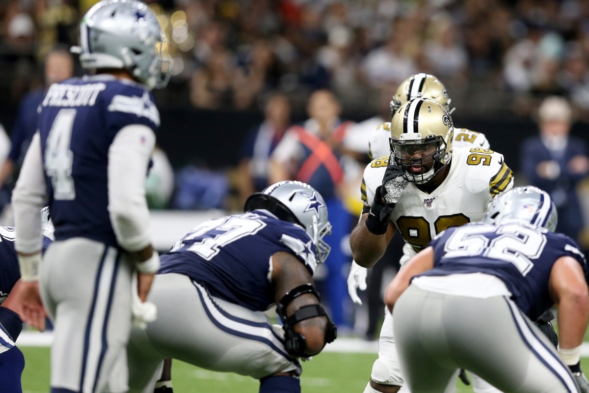 Dallas Cowboys quarterback Dak Prescott (4) looks over the New Orleans defense. Mandatory Credit: Chuck Cook-USA TODAY 