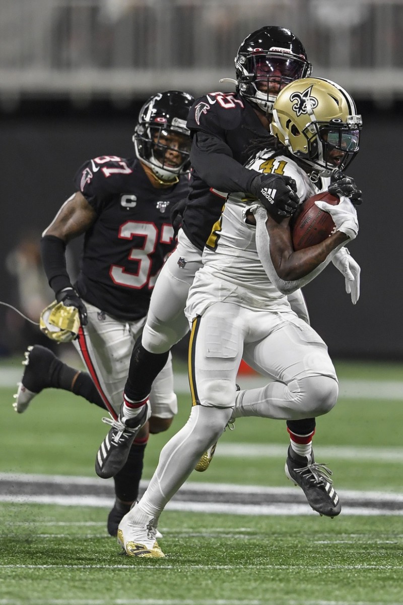 Saints running back Alvin Kamara (41) is tackled from behind by Atlanta Falcons linebacker Deion Jones (45). Mandatory Credit: Dale Zanine-USA TODAY 