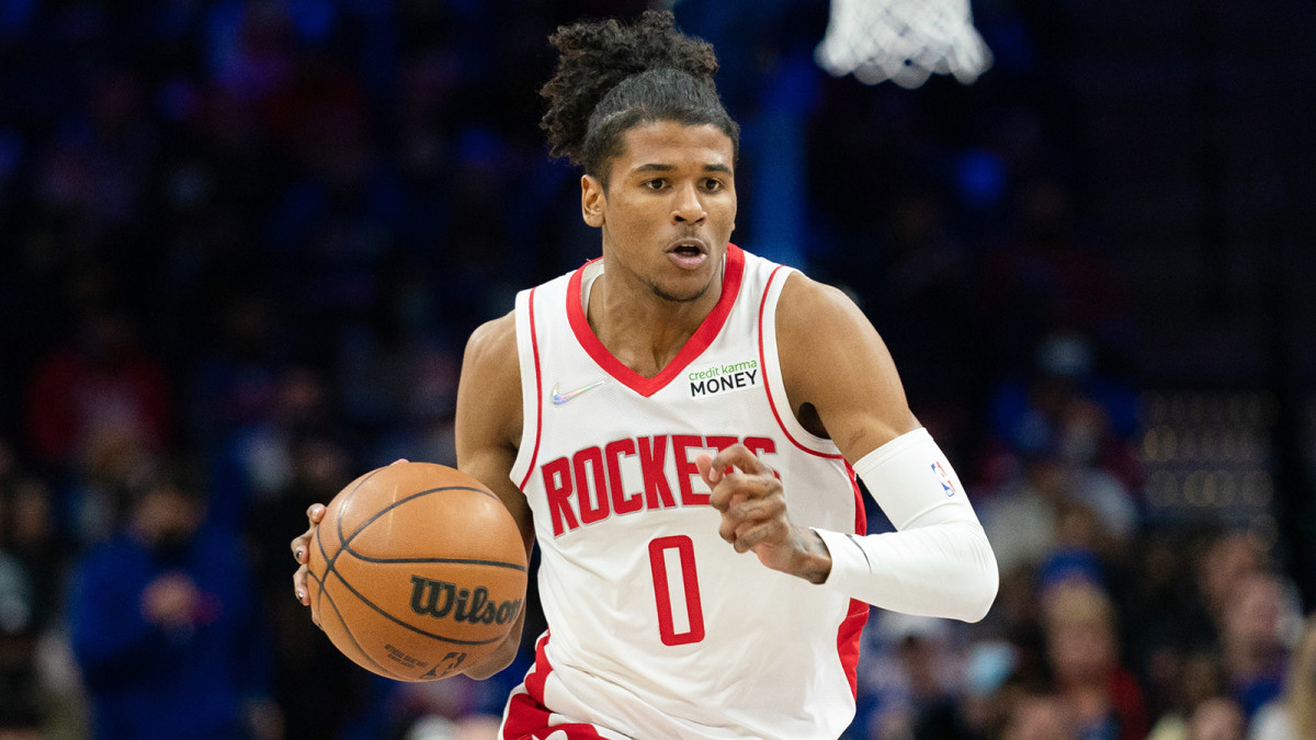 Houston Rockets guard Jalen Green (0) dribbles the ball against the Philadelphia 76ers.