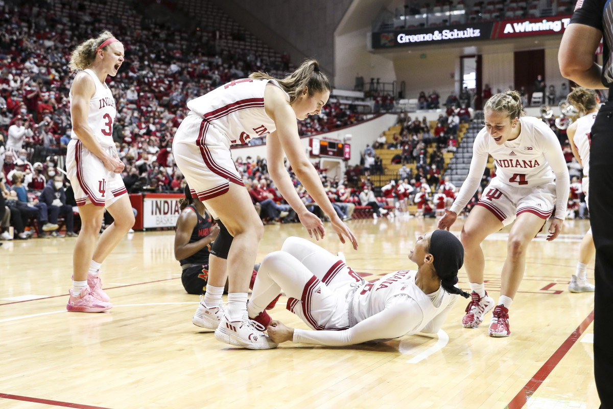 Mackenzie Holmes helps up forward Kiandra Browne.