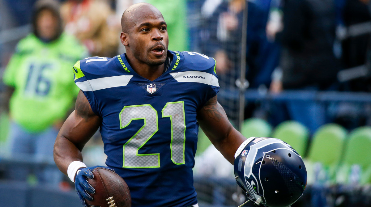 Dec 5, 2021; Seattle, Washington, USA; Seattle Seahawks running back Adrian Peterson (21) returns to the locker room following pregame warmups against the San Francisco 49ers at Lumen Field.