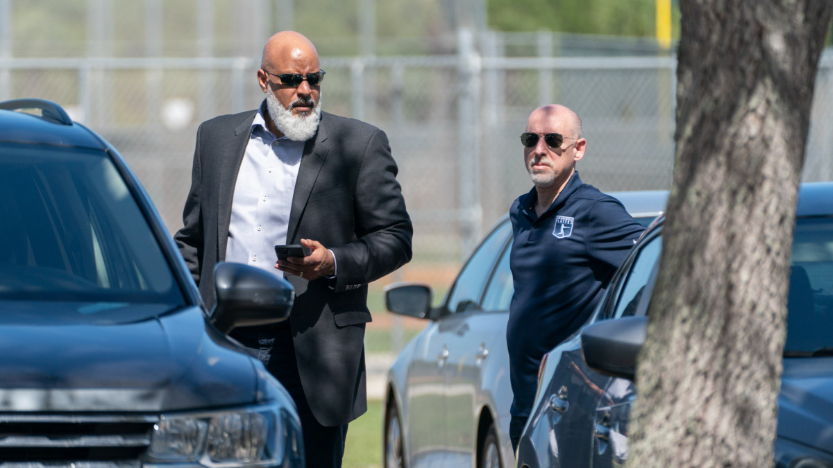 Feb 23, 2022; Jupiter, FL, USA; Major League Baseball Players Association executive director Tony Clark, left, and chief negotiator Bruce Meyer, arrive for contract negotiations at Roger Dean Stadium in Jupiter, Florida on February 23, 2022. Mandatory Credit: Greg Lovett-USA TODAY NETWORK