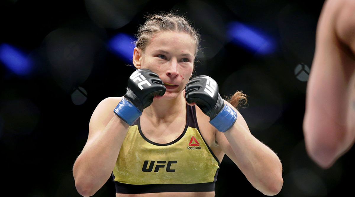 Sabina Mazo (red gloves) fights Maryna Moroz (blue gloves) during UFC Fight Night at Wells Fargo Arena.